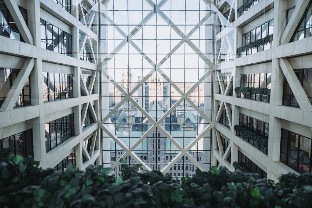 Interior atrium of the Hennepin County Government Center in Minneapolis showing the glass facade and downtown skyline, a Minneapolis wedding photography location